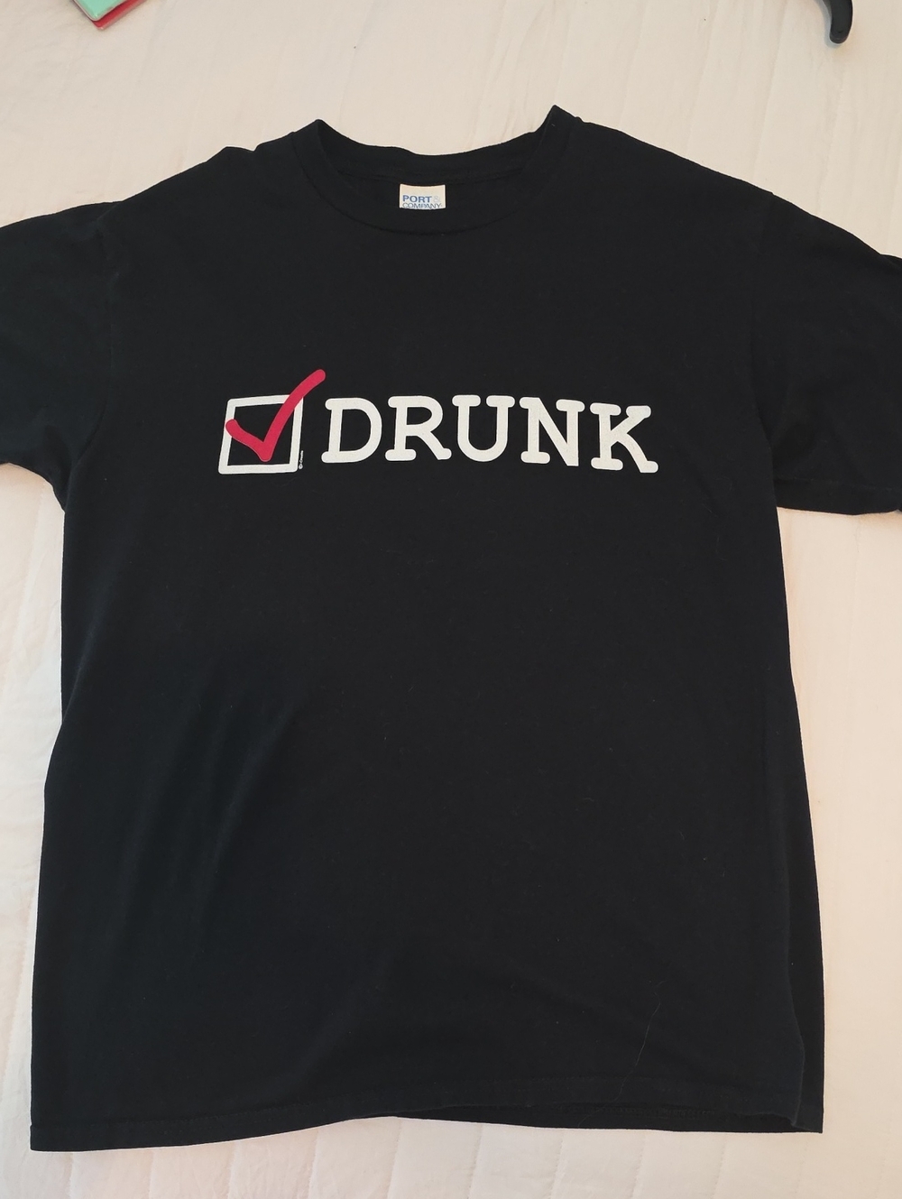 Port and Company Black Tee with White "DRUNK" Graphic and Red Check